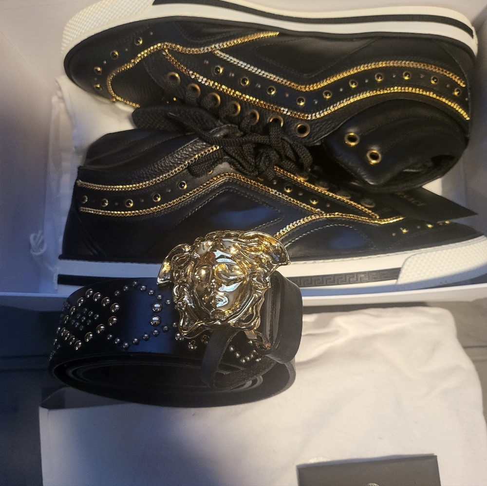 Black High-Top Sneakers with Gold Accents and Belt